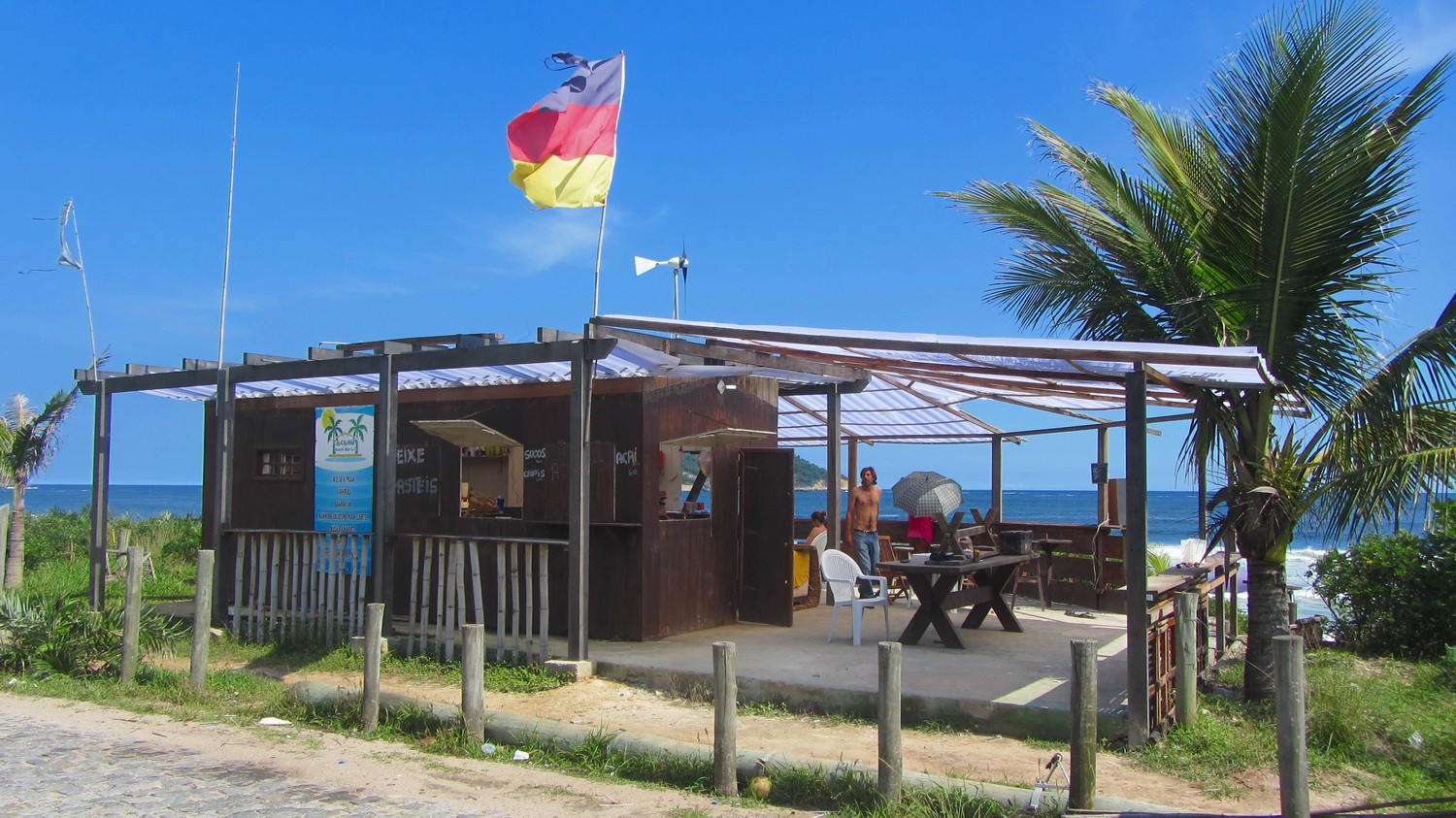 German flag on the beach of Grumari